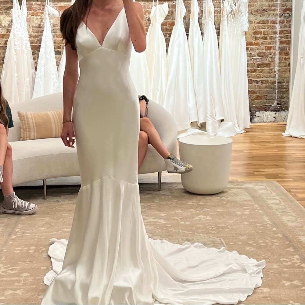 Brand New, unaltered Theia Couture Jean wedding dress. Size 0.